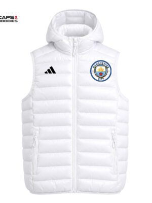 Manchester City White Half Puffer Vest Brand Collaboration: Manchester City & Adidas Color: White Material: Lightweight, insulated polyester blend Design: Sleeveless half puffer vest with quilted stitching Closure: Full front zipper Logos: Manchester City crest (left chest), Adidas logo (right chest, black) Features: Adjustable hood, two zippered side pockets Fit: Regular fit, versatile layering piece Target Audience: Football fans, lifestyle wearers, and sports enthusiasts